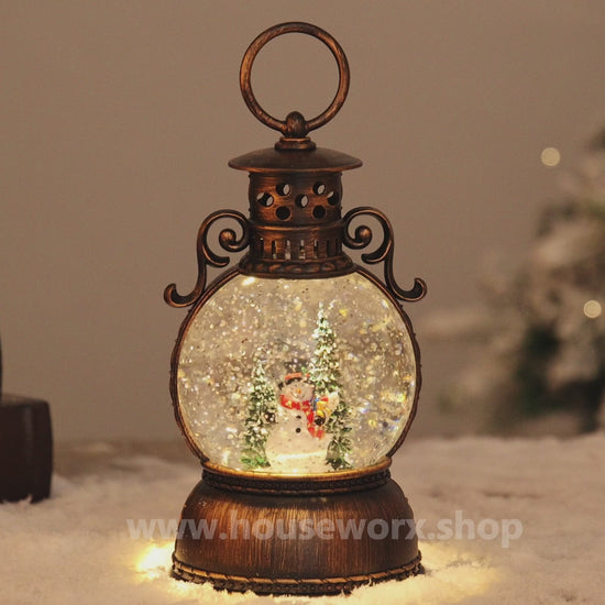 Palace christmas snow globe front snowman video
