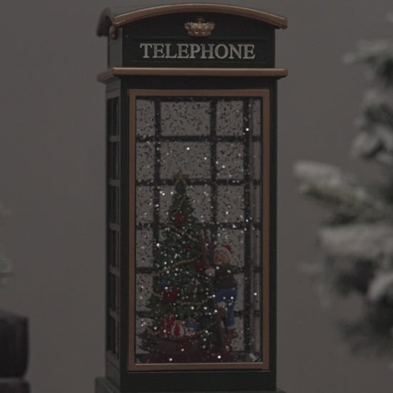telephone booth christmas snow globe christmas tree video