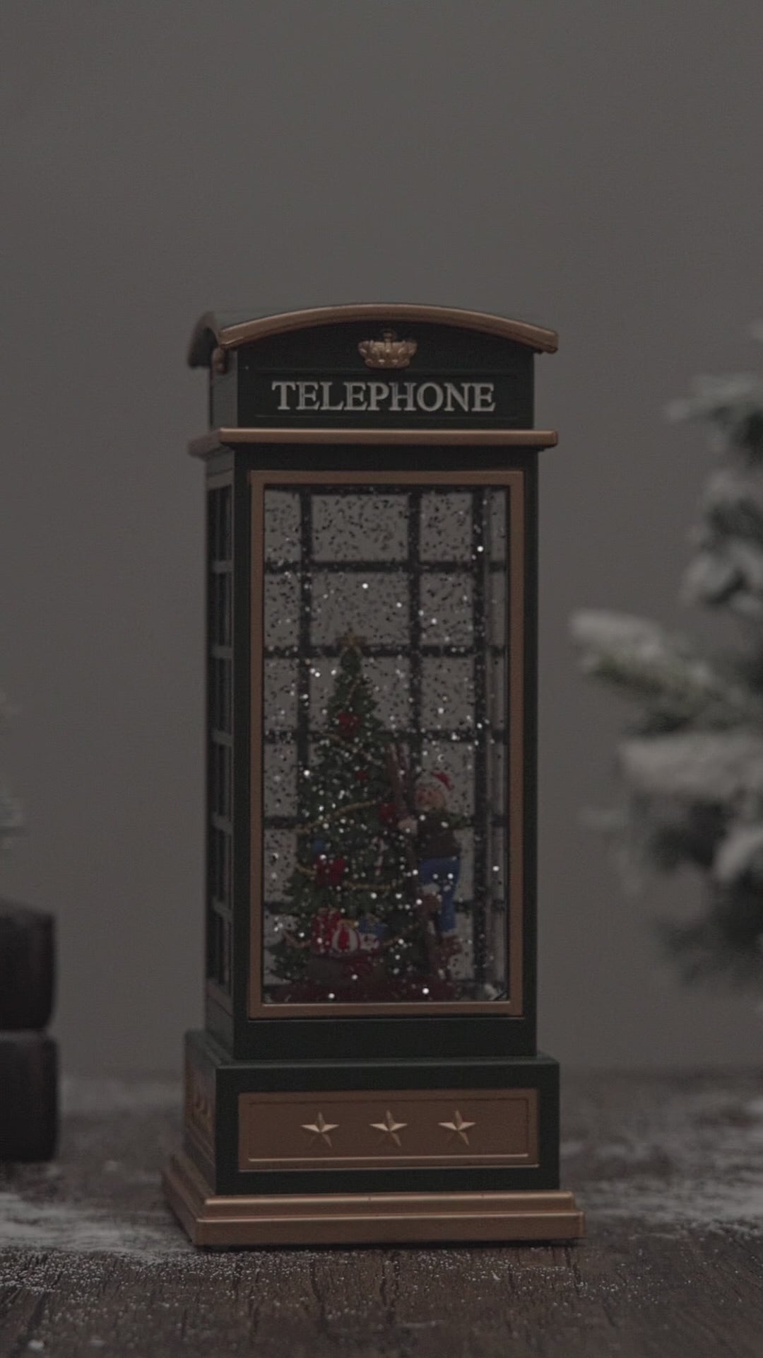 telephone booth christmas snow globe christmas tree video