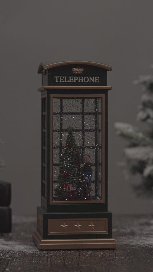 telephone booth christmas snow globe christmas tree video
