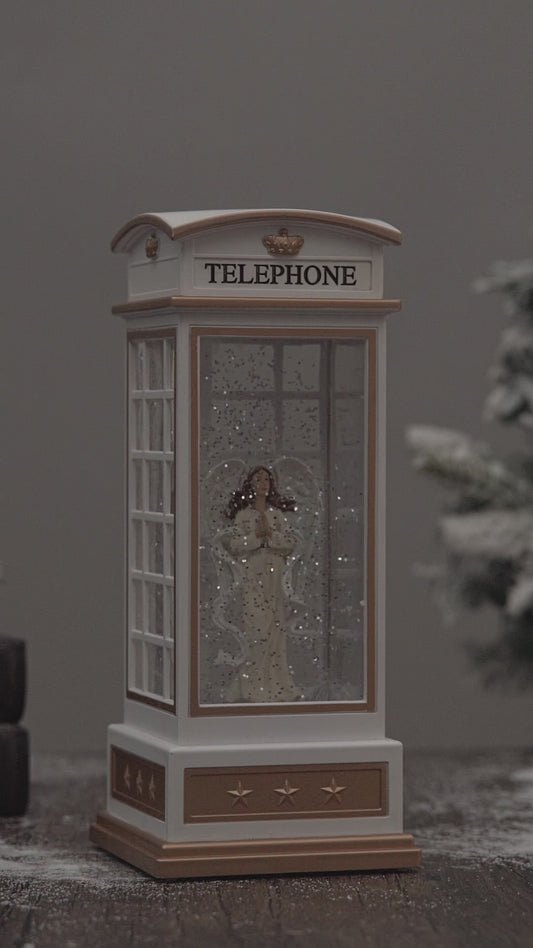 telephone booth christmas snow globe angel video