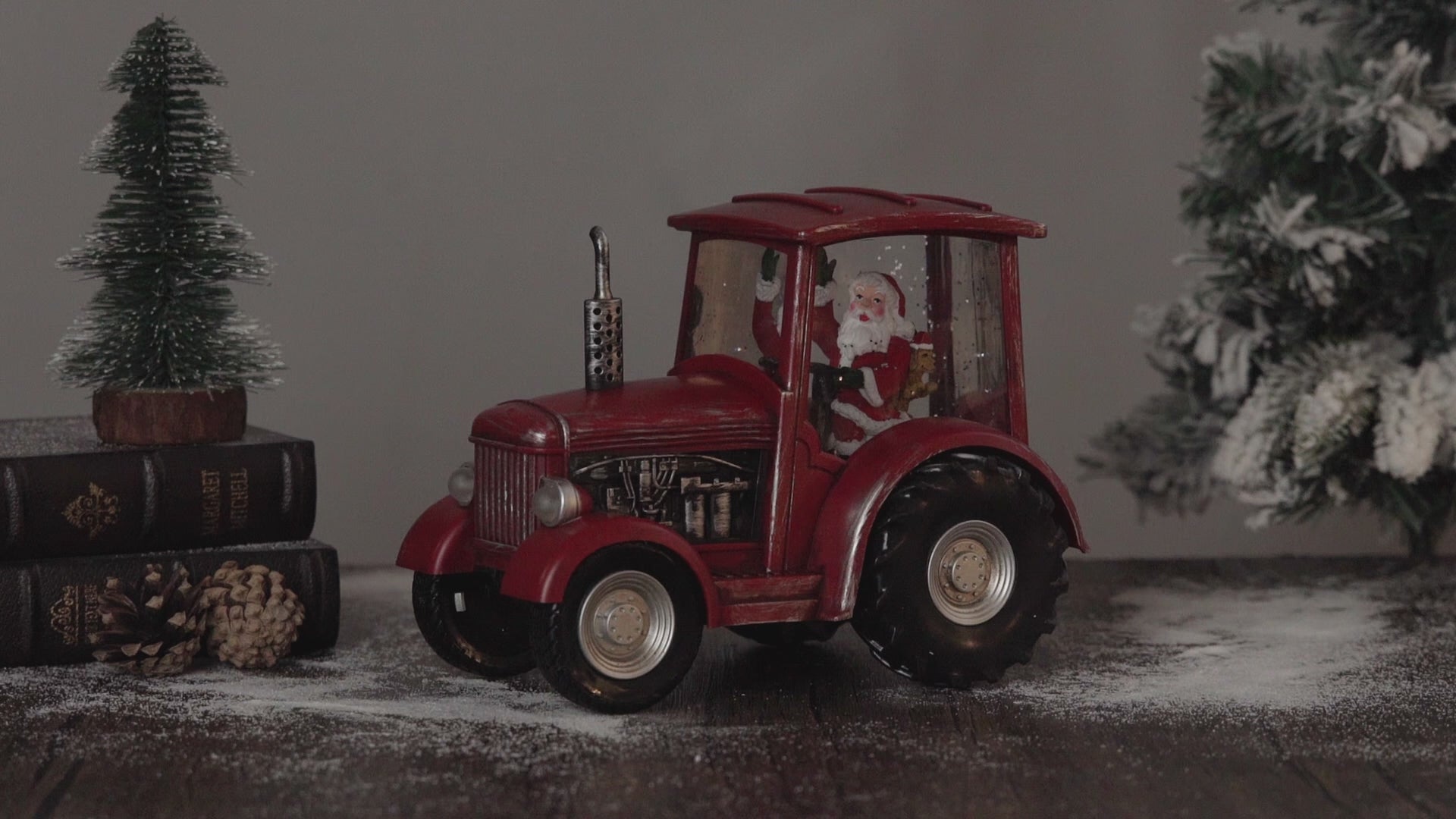 red tractor christmas snow globe video