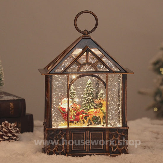 stable christmas snow globe santa video