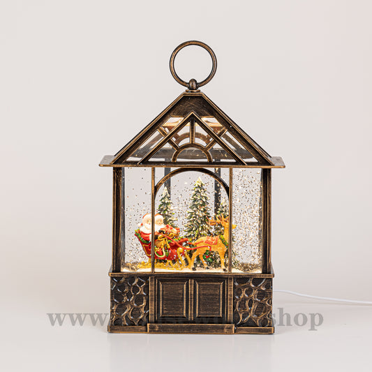 stable christmas snow globe santa front
