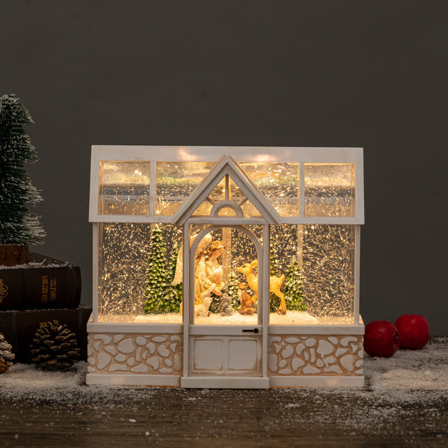 green/glass house christmas snow globe angel