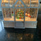 green glass house christmas snow globe snowman