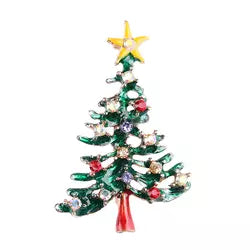 A brooch designed as a green Christmas tree adorned with multicolored rhinestones and topped with a yellow star.